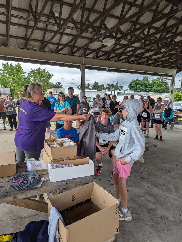 Runners prepare for 5k at Barryton Lilac Festival